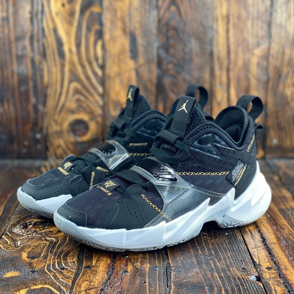 Jordan Kids Black and White Sneakers with Gold Accents